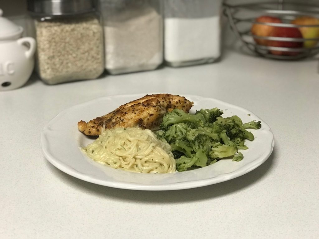 Chicken breast with broccoli and garlic pasta